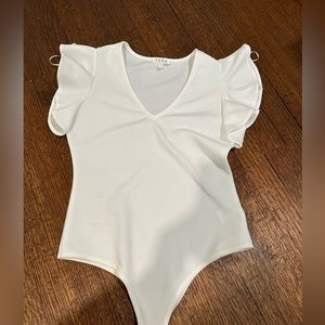 White ruffle bodysuit